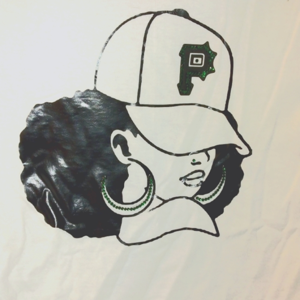 White T with afro woman in baseball hat